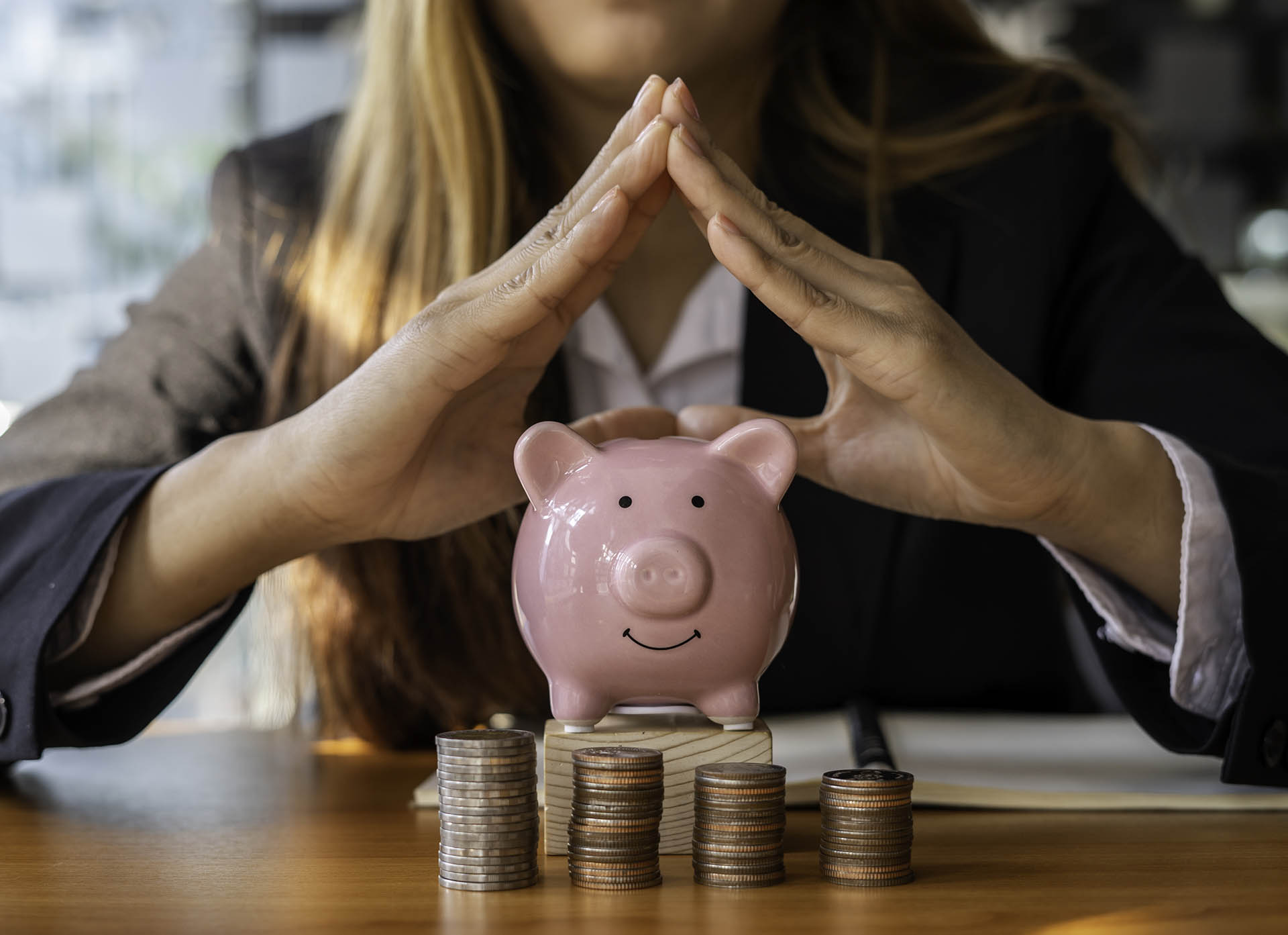 business woman protecting piggy bank it is like sa 2023 11 27 05 17 30 utc Guides